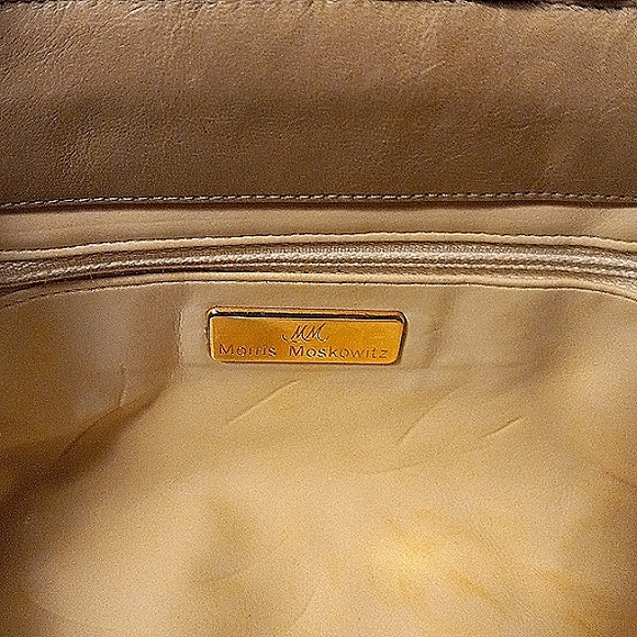 Morris Moskowitz tri colored taupe leather clutch.